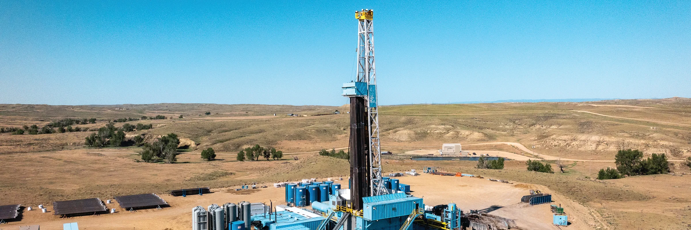 Drone view of an Anschutz Exploration drilling rig on the open plains
