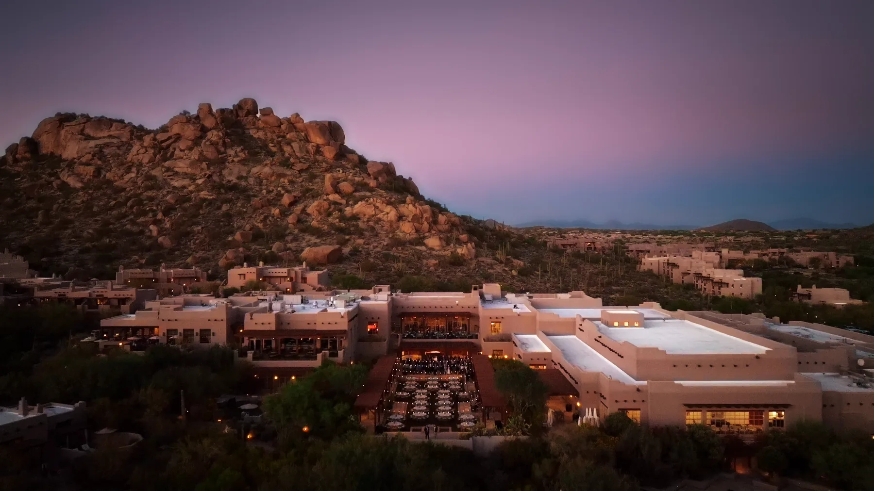 Desert resort venue at dusk, aerial view from the AEC CEO Summit