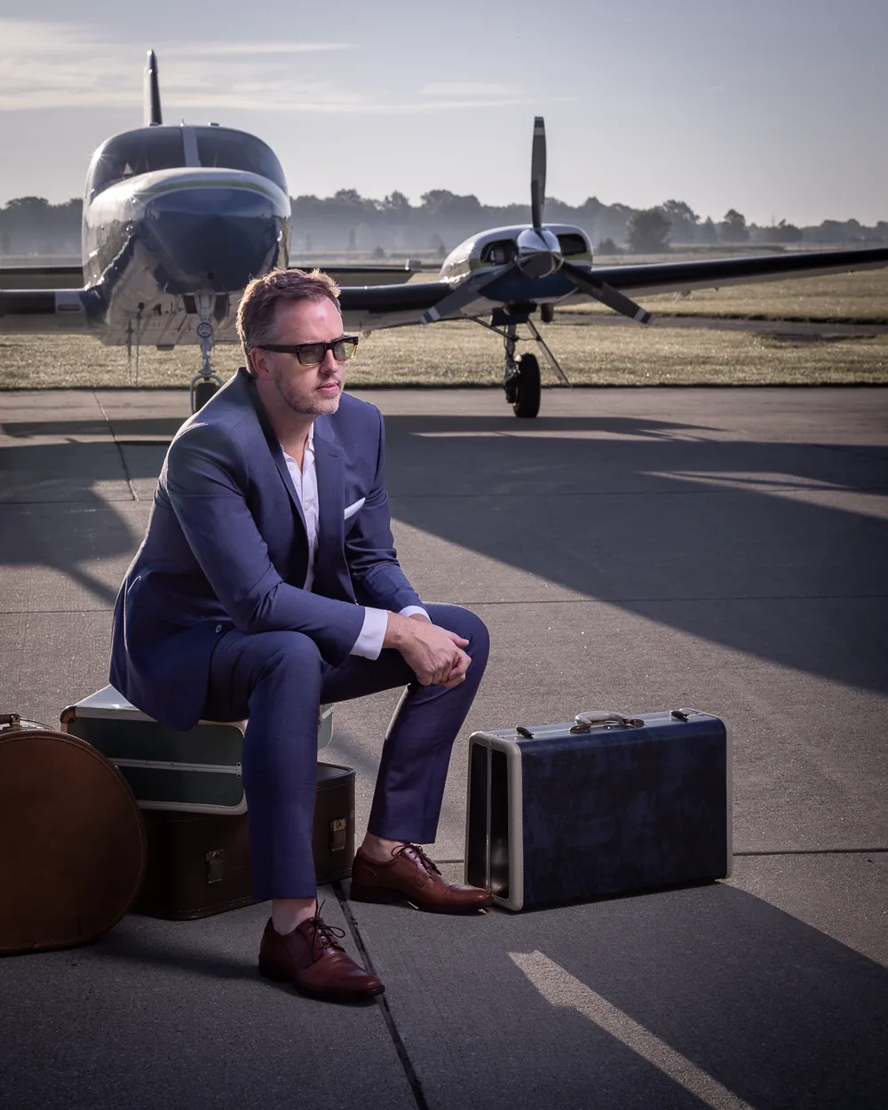 Executive portrait on the tarmac with a private aircraft